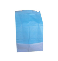 Baberos desechables bicapa con bolsillo 70 x 37